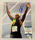 USAIN BOLT SIGNED 11x14 PHOTO OLYMPICS JAMAICA GOLD MEDAL AUTO+BECKETT COA! 14