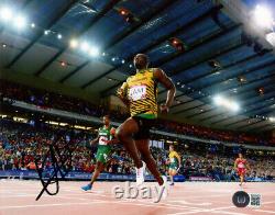 USAIN BOLT SIGNED AUTOGRAPHED 8x10 PHOTO OLYMPIC TRACK GOLD MEDALIST BECKETT BAS