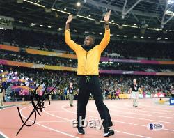 USAIN BOLT SIGNED AUTOGRAPHED 8x10 PHOTO OLYMPIC TRACK GOLD MEDALIST BECKETT BAS