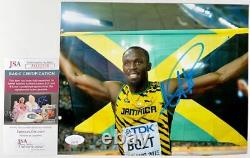 Usain Bolt Olympic Sprinter Signed Jamaican Flag 8x10 Photo Autograph JSA COA