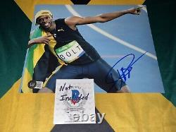Usain Bolt Signed 8x10 Photo Fastest Man In Earth Jamaican Legend Beckett #16