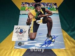 Usain Bolt Signed 8x10 Photo Fastest Man In Earth Jamaican Legend Beckett #25