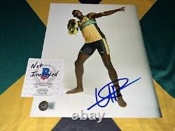 Usain Bolt Signed 8x10 Photo Fastest Man In Earth Jamaican Legend Beckett #35