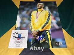 Usain Bolt Signed 8x10 Photo Fastest Man In Earth Jamaican Legend Beckett #37