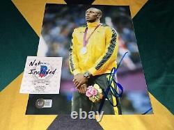 Usain Bolt Signed 8x10 Photo Fastest Man In Earth Jamaican Legend Beckett #48