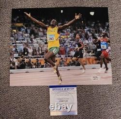 Usain Bolt Signed 8x10 Photo Olympics Fastest Man Gold Psa/dna Auth #am57141
