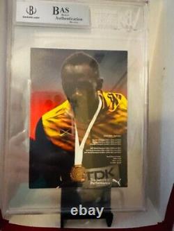 Usain Bolt Signed Auto Official Puma Promo Photo Beckett BAS COA TC Slabbed
