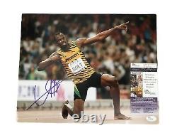 Usain Bolt Signed Jamaica Olympic Sprinting 11x14 Photo JSA Record Victory Pose