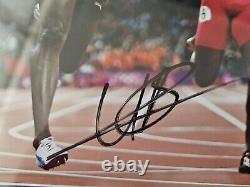 Usain Bolt signed 11x14 photo, JSA COA